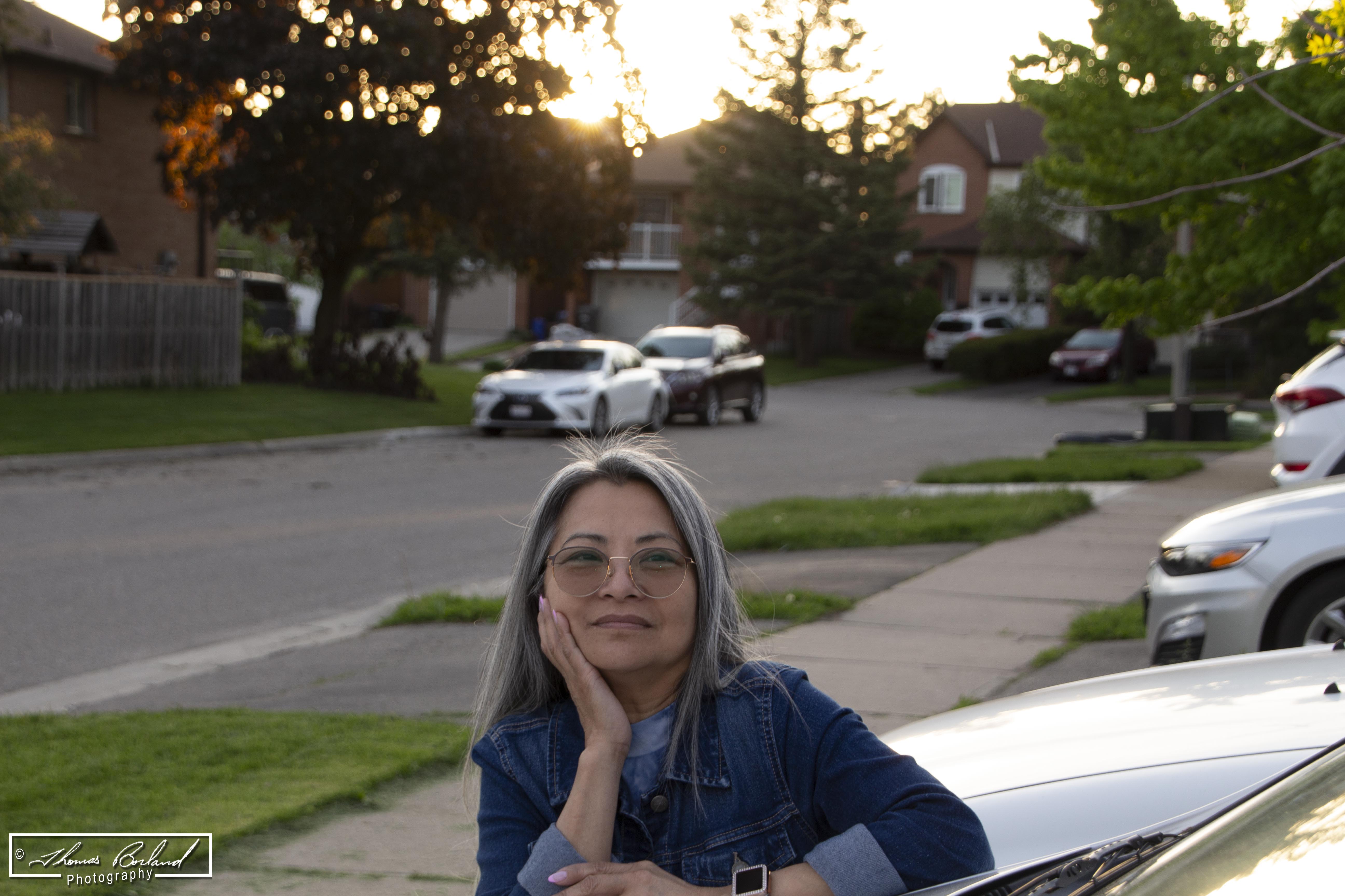 Beautiful Woman Leaning On Car